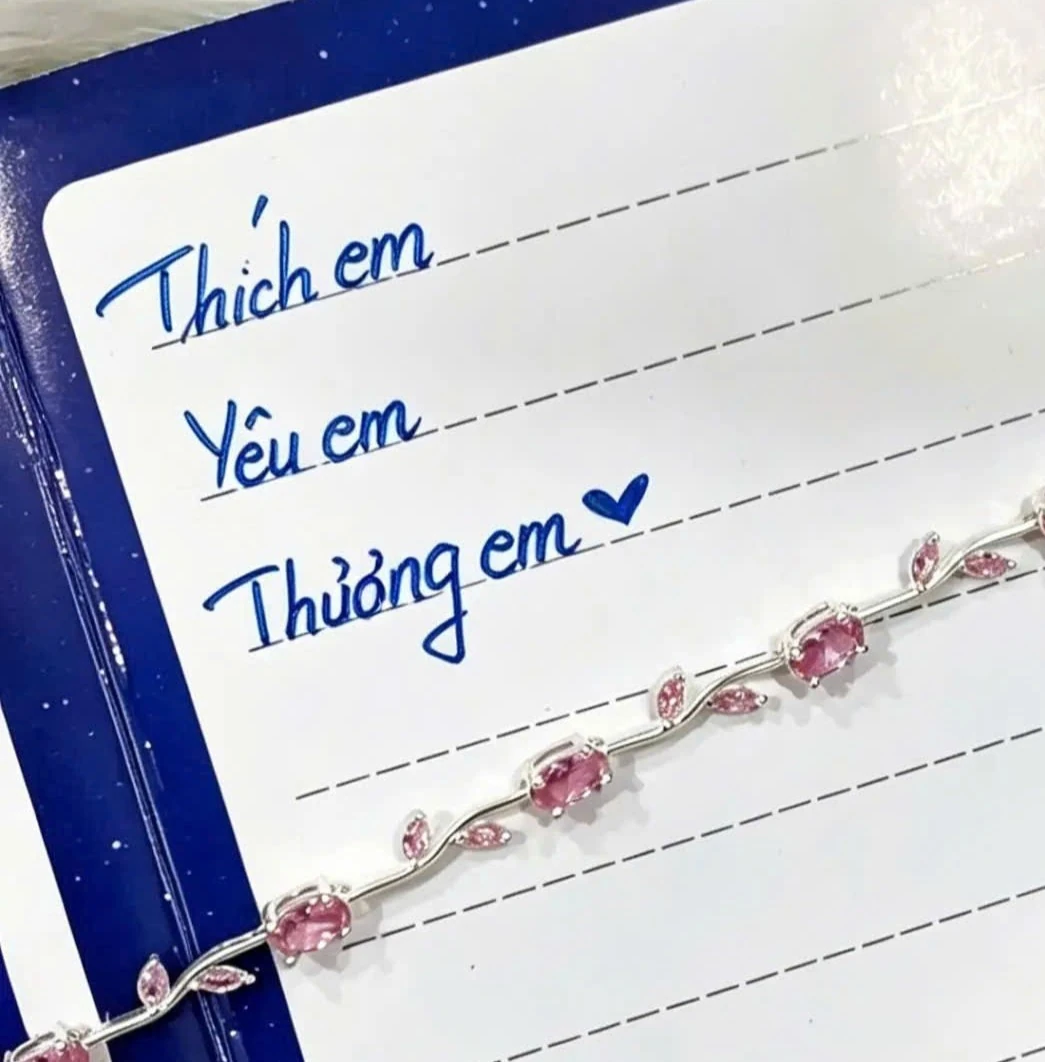 Lắc tay bạc nơ hồng Asimi